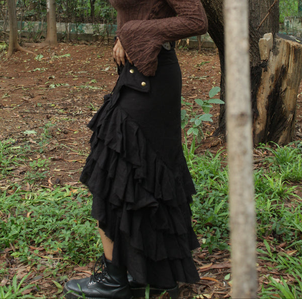 Boho girl wearing black skirt in a park